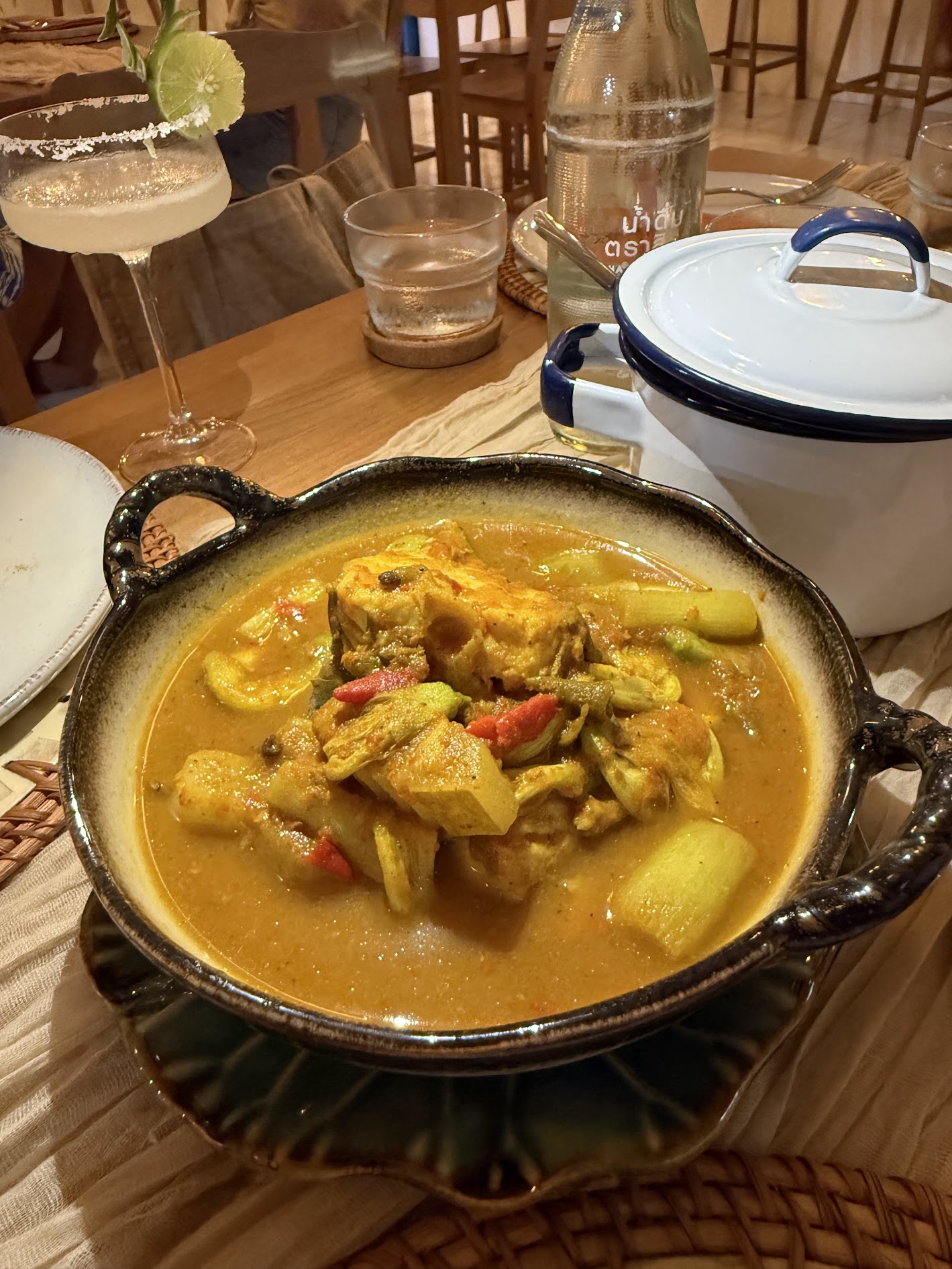 Slow-cooked massaman curry in stoneware bowl