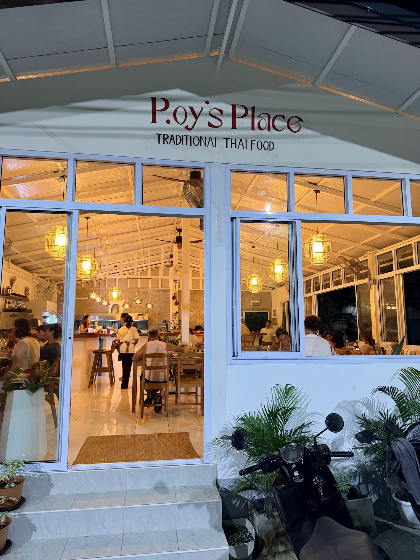 P.oy's Place entrance at night on Koh Tao