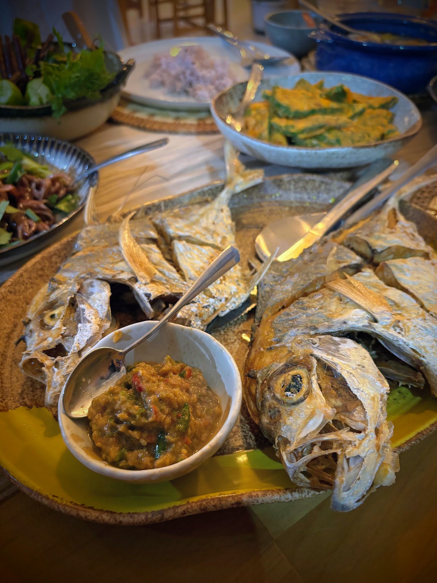 Whole fried fish from the island's boats with chilli dip