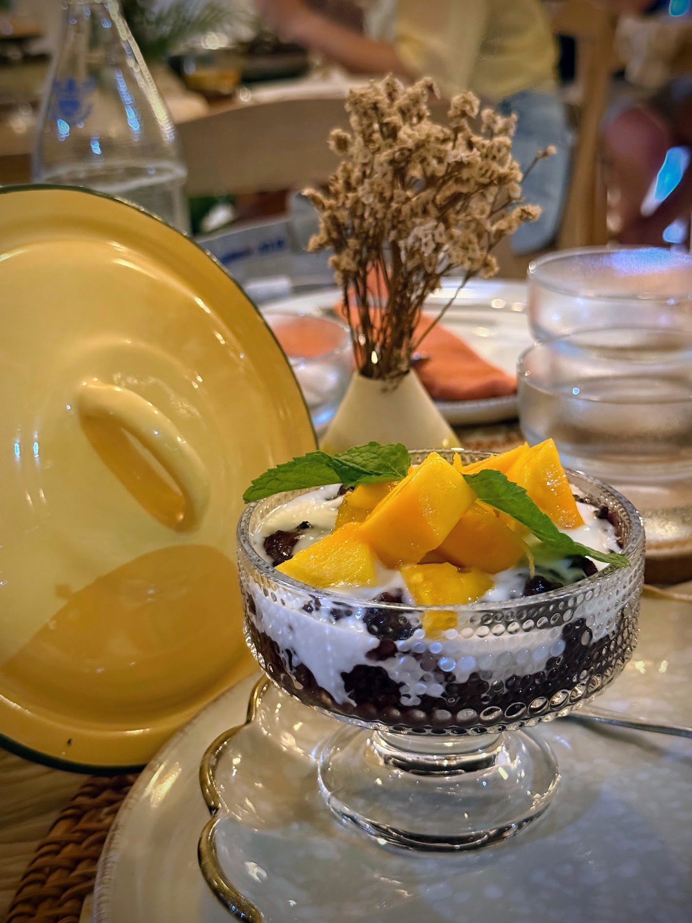 Mango sticky rice with black rice and coconut cream